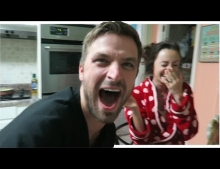 Husband surprises wife by letting her know she is pregnant.