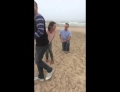 Surprise marriage proposal turns funny after mom trips over a rock.