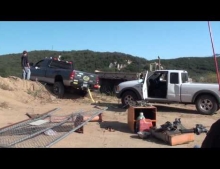 Ford Ranger Pulls Out A Stuck Dodge Ram Full Size Truck With A 30 Foot Strap And Loses Its Bumper And Tow Hook In The Process.