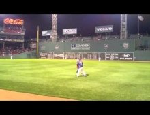 Drunk guy at a Boston Red Sox game runs onto the field and gets speared hard by a security guard.