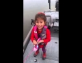 Little girl reels in a huge bass with her Barbie fishing pole.