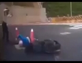 Scooter rider in Taiwan gets hit by a car then falls into a manhole. 