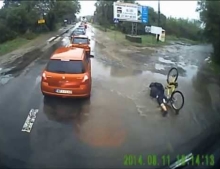 Bicycle Rider Does An Unintentional Endo Followed By A Face Plant Into A Large Puddle Of Water.
