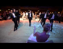 Groom and his groomsmen surprise the bride with an awesome wedding dance medley.