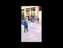 Cristiano Ronaldo dresses up as a homeless man and surprises a kid on the street in Madrid.