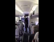 Flight attendant shows off her dance moves to the tune of Uptown Funk by Mark Ronson ft. Bruno Mars