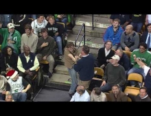 Guy at Boston Celtics basketball game rocks out to Livin' on a Prayer by Bon Jovi.