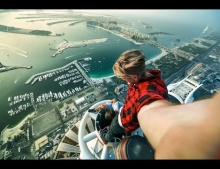 Two crazy Russian guys just hanging out on top of the 1,358 feet high Princess Tower in Dubai.