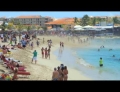 People getting blown at the beach at Princess Juliana International Airport in St. Maarten