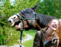 A Woman And Her Horse Have A Great Laugh Together. It Must Have Been A Good Joke.