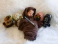 A very young Jedi in training.
