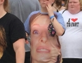 After you check out the woman's shirt with the huge face, look at the woman behind her.