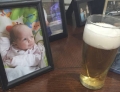 Baby already has his eye on beer.