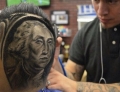 Barber With Amazing Talent. He Trims Up A Perfect Portrait Of George Washington On The Back Of This Guys Head.