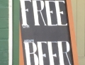Clever sign to get people in the door offering free beer. Nobody reads the fine print these days.