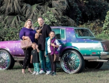 Did this family buy their clothes before or after painting their car?