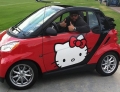 Former NFL Football Player Antonio Garay shows his sweeter side while driving around in his Hello Kitty inspired Smart Car.