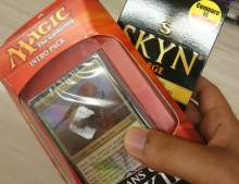 How to totally confuse the cashier. Magic: The Gathering intro pack and condoms.