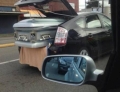 If my casket ever gets taken in a Prius, just shoot me...oh wait.