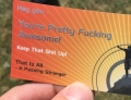 Passing stranger hands out business cards.