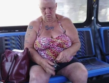 This woman on the bus has so much sex appeal she decided to get it tattooed on her chest.