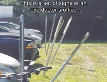 Signs at an eye doctor's office.