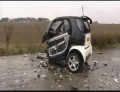 Smart car accidentally hits a squirrel, but don't worry, the squirrel is just fine.