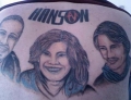 This dudes Hanson tattoo would be pretty cool if MMMBop was still a Top 40 hit.
