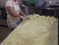 This Picture Of A Woman Cutting A Huge Pile Of Onions By Hand Will Make You Cry Just Looking At It. 