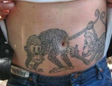 This tattoo should really impress the ladies.....or the monkeys at the zoo.