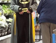 This Walmart shopper is either a huge fan of Batman or thinks they are Batman.