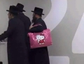 Three Jews walk into a bar with a Hello Kitty purse...