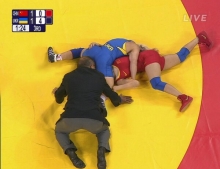 Wrestling Referee Really Likes To Get Up Close And Personal In The Action.