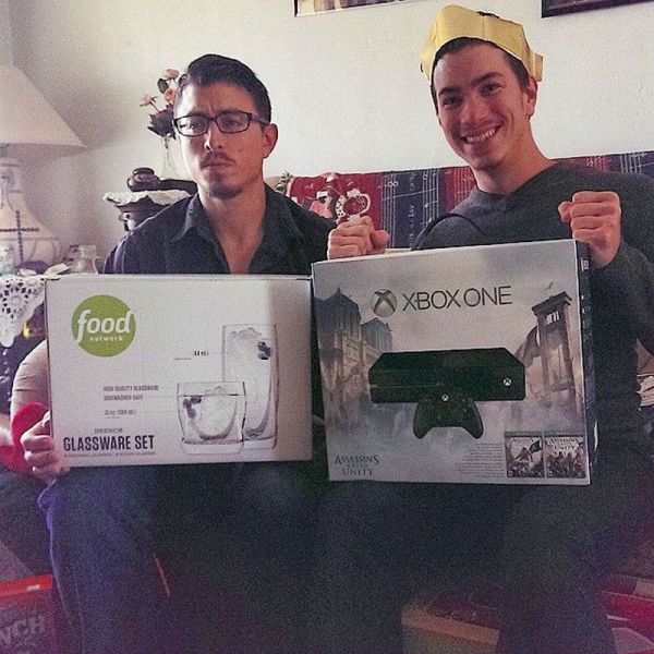 Can you tell who was happy with their Christmas present and who wasn't? Glassware Set vs Xbox One.