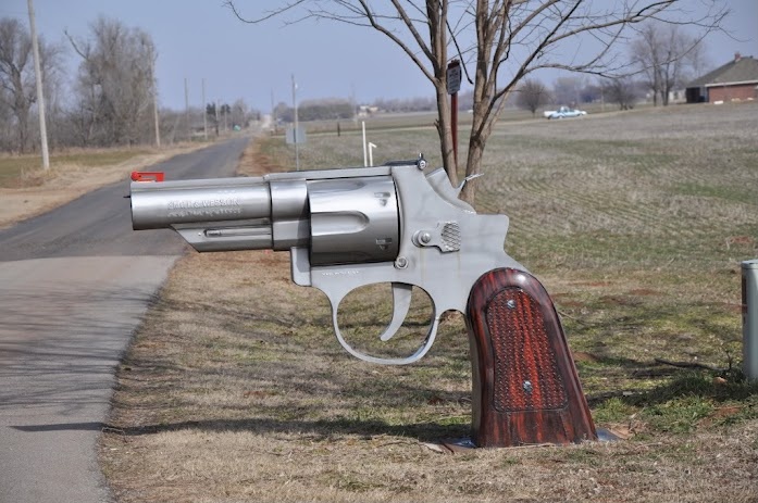 Giant gun mailbox is sure to deter thieves.