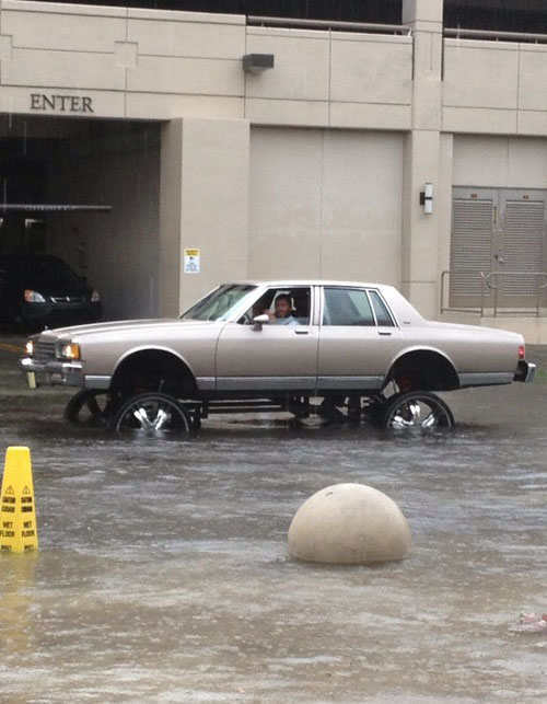It All Makes Perfect Sense Now. Huge Rims Help You Get Through Floods.