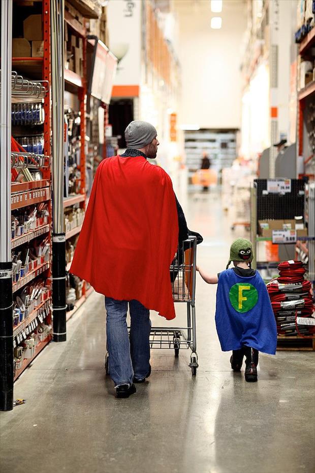 Superdad and his sidekick doing some shopping.