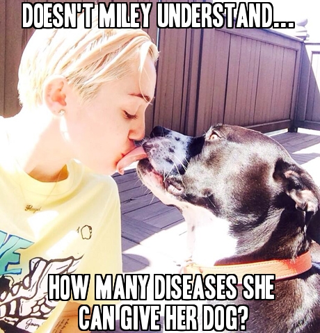 Miley Cyrus kissing her dog on the lips.