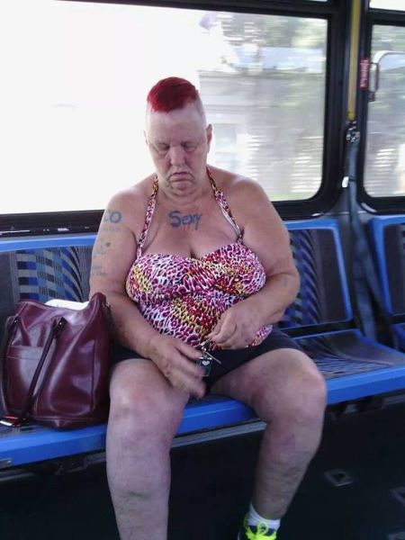 This woman on the bus has so much sex appeal she decided to get it tattooed on her chest.