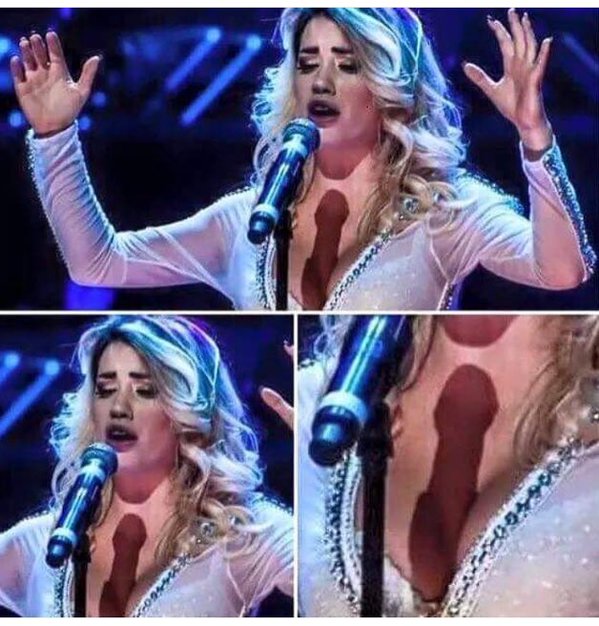 The shadow of the microphone on her boobs is pure magic.