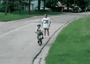 This Kid Is Learning How To Ride A Bike. His Mom Taught Him Everything Except How To Use The Brakes.
