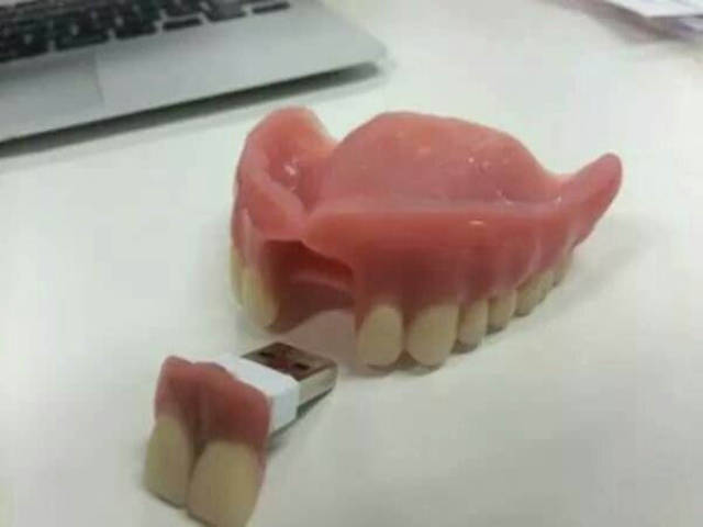Keep your USB drive safe and secure with these custom dentures.