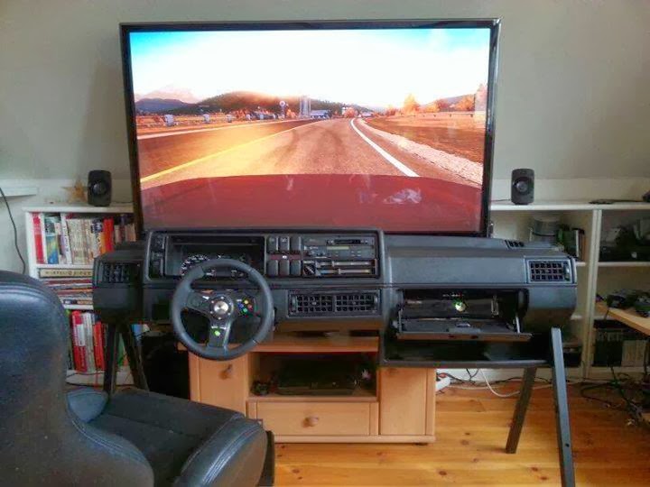 Very realistic driving simulator video game set up.